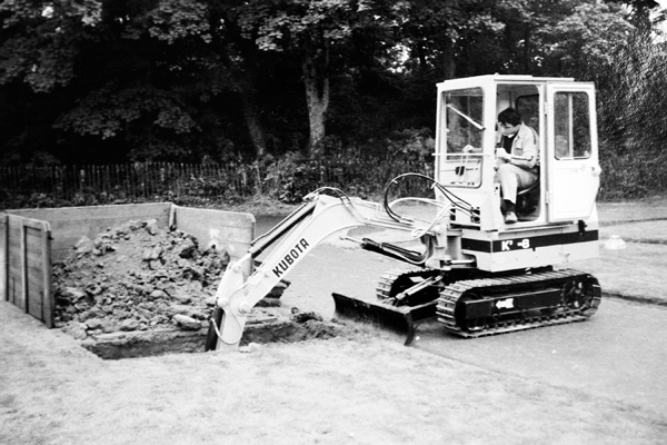 Kubota K8 digging a grave in 1982