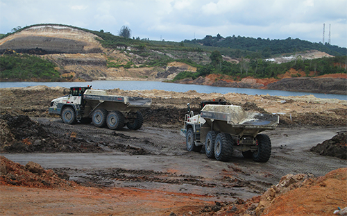 Ten Terex Trucks TA400s shift soil in Indonesian mine