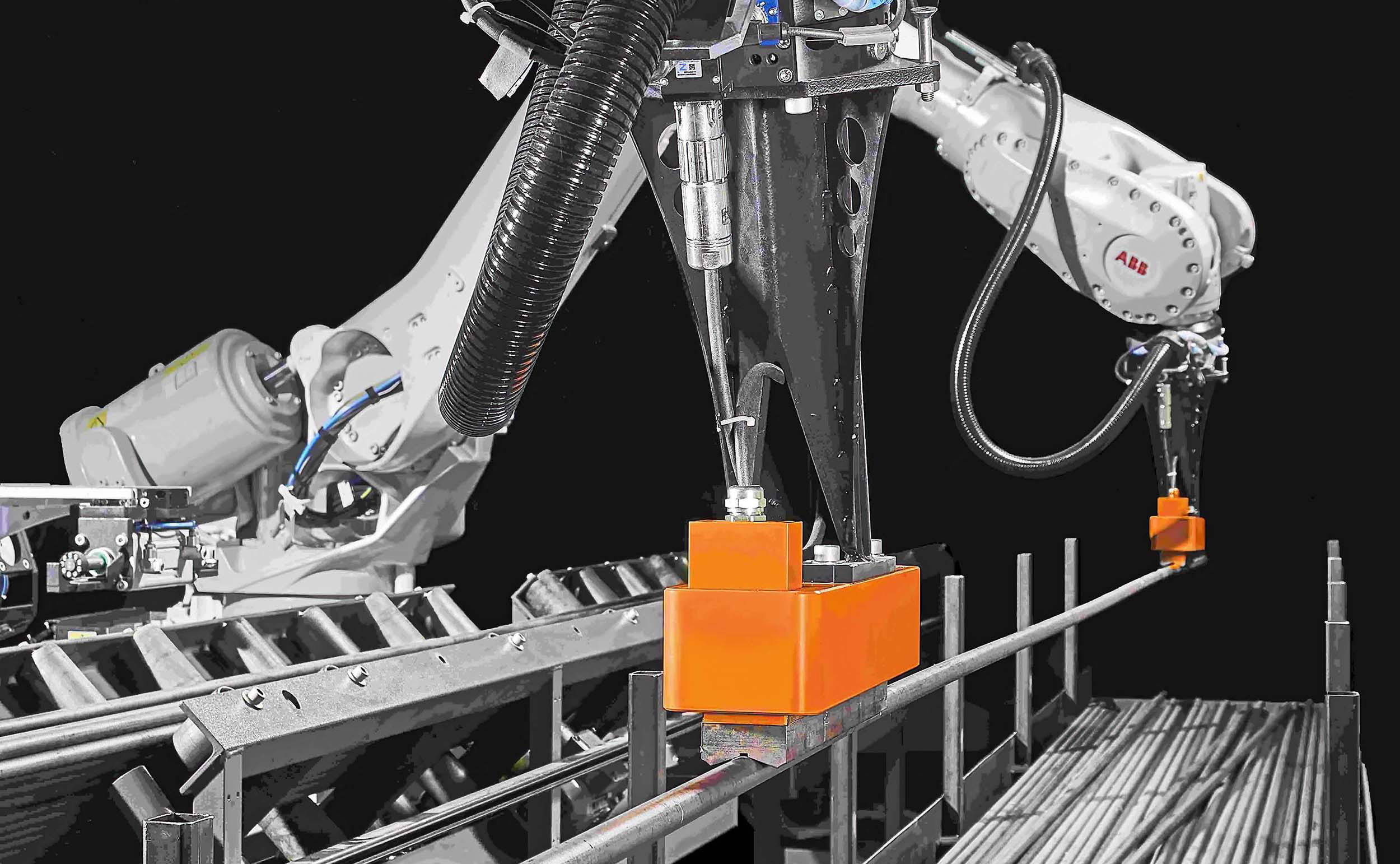 The new, twin-robot KASTOpick bar system for automatically picking up randomly-placed magnetic steel long stock and stacking it neatly for subsequent added-value processing or for bundling ready for delivery to customers.